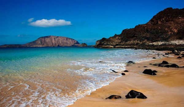 Photo de una playa en las islas Canarias
